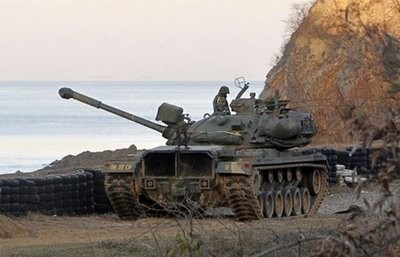 A South Korean marine tank is seen on Yeonpyeong island in the disputed waters of the Yellow Sea on November 26. A South Korean marine tank is seen on Yeonpyeong island in the disputed waters of the Yellow Sea on November 26.