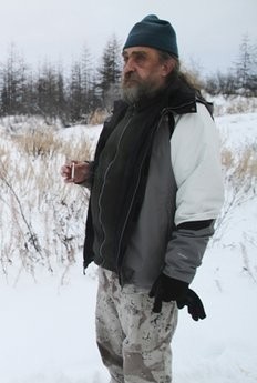 In this Oct. 23, 2010 photo, Russian scientist Sergey Zimov walks on a Siberian lake near the town of Chersky, Russia, where methane bubbles are trapped under the ice. In this Oct. 23, 2010 photo, Russian scientist Sergey Zimov walks on a Siberian lake near the town of Chersky, Russia, where methane bubbles are trapped under the ice.