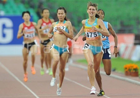 Thanh Hằng (trái) về nhì đoạt Huy chương Bạc nội dung chạy 800 mét. Ảnh: AFP Thanh Hằng (trái) về nhì đoạt Huy chương Bạc nội dung chạy 800 mét. Ảnh: AFP
