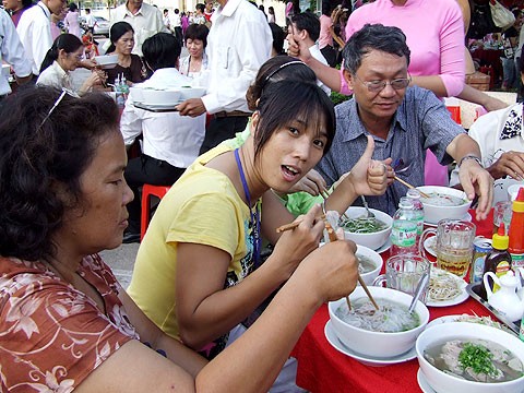 Even goumets like enjoying Pho at a street food shop Even goumets like enjoying Pho at a street food shop