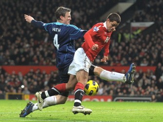 Stoke City's German defender Robert Huth (L) vies with Manchester United's Mexican forward Javier Hernández during the game. AFP Stoke City's German defender Robert Huth (L) vies with Manchester United's Mexican forward Javier Hernández during the game. AFP