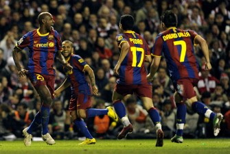 Barcelona's French defender Eric Abidal (L) celebrates his goal with teammates during the King's Cup match Athletic Bilbao vs FC Barcelona on January 5, 2011 at the San Mames stadium in Bilbao. Match ended 1-1. AFP Barcelona's French defender Eric Abidal (L) celebrates his goal with teammates during the King's Cup match Athletic Bilbao vs FC Barcelona on January 5, 2011 at the San Mames stadium in Bilbao. Match ended 1-1. AFP
