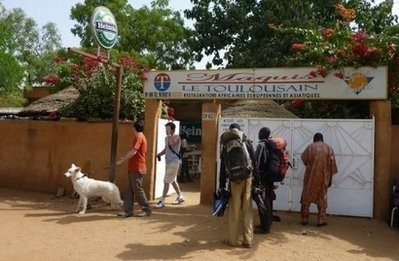 People are seen here outside 'Le Toulousain' restaurant in Niamey. People are seen here outside 'Le Toulousain' restaurant in Niamey.