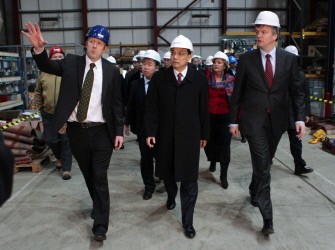Chinese Vice Prime Ministerr Li Keqiang (C) is escorted on a tour of the Pelamis Wave Power factory in Edinburgh, Scotland, on the first of a four-day visit to the United Kingdom on January 9, 2011. Chinese Vice Prime Ministerr Li Keqiang (C) is escorted on a tour of the Pelamis Wave Power factory in Edinburgh, Scotland, on the first of a four-day visit to the United Kingdom on January 9, 2011.