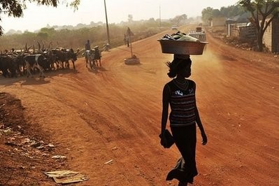 AFP file - A pedestrian walks on an unpaved road in Juba, the capital of Southern Sudan. AFP file - A pedestrian walks on an unpaved road in Juba, the capital of Southern Sudan.