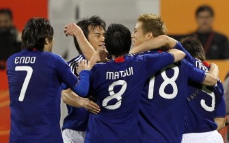 Japan's players celebrate with teammate Keisuke Honda (2nd R) after he scored a penalty goal against Syria on January 13, 2011. Japan won the match 2-1. AFP Japan's players celebrate with teammate Keisuke Honda (2nd R) after he scored a penalty goal against Syria on January 13, 2011. Japan won the match 2-1. AFP