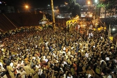 Hindu devotees are seen praying at the Sabarimala temple during the Maravilakku festival marking the end of a two-month pilgrimage to the Lord Ayyappa temple in Kerala, south India. Hindu devotees are seen praying at the Sabarimala temple during the Maravilakku festival marking the end of a two-month pilgrimage to the Lord Ayyappa temple in Kerala, south India.