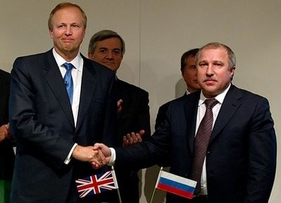 Oil giant BP Chief Executive Bob Dudley (L) shakes hand with state-run Russian firm Rosneft's President Eduard Khudainatov after signing an agreement to form a global and arctic strategic alliance at the BP headquarters in central London. Oil giant BP Chief Executive Bob Dudley (L) shakes hand with state-run Russian firm Rosneft's President Eduard Khudainatov after signing an agreement to form a global and arctic strategic alliance at the BP headquarters in central London.