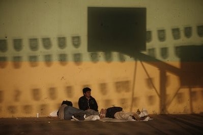 In this photo taken Jan. 9, 2011, migrants from Central America headed northwards towards the U.S. rest at a temporary shelter in Chahuites, in Mexico's southern state of Oaxaca. In this photo taken Jan. 9, 2011, migrants from Central America headed northwards towards the U.S. rest at a temporary shelter in Chahuites, in Mexico's southern state of Oaxaca.