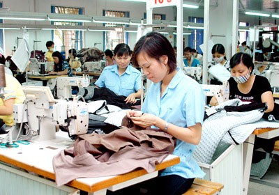 Workers at a garment company (File photo) Workers at a garment company (File photo)