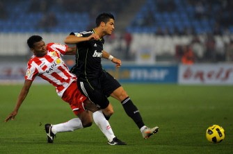 Real Madrid's Ronaldo (R) vies with Almeria's Kalu Uche during the Spanish match Almeria vs Real Madrid on January 16, 2011 at the Juegos Mediterraneos stadium in Almeria. The match ended with a draw 1-1. AFP Real Madrid's Ronaldo (R) vies with Almeria's Kalu Uche during the Spanish match Almeria vs Real Madrid on January 16, 2011 at the Juegos Mediterraneos stadium in Almeria. The match ended with a draw 1-1. AFP