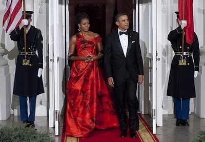 US President Barack Obama and First Lady Michelle Obama arrive to greet Chinese President Hu Jintao upon his arrival on the North Portico of the White House in Washington, DC, prior to hosting a State Dinner. US President Barack Obama and First Lady Michelle Obama arrive to greet Chinese President Hu Jintao upon his arrival on the North Portico of the White House in Washington, DC, prior to hosting a State Dinner.