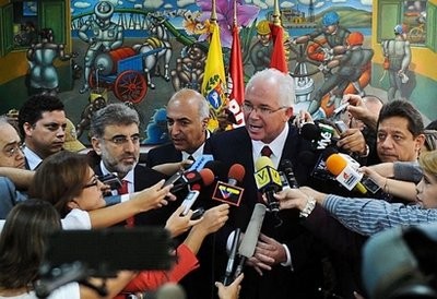 Venezuela's Minister of Energy and Petroleum Rafael Ramirez (C) speaks with the press as Turkey's Minister of Energy and Natural Resources Taner Yildiz (L) looks on, after a meeting in Caracas Venezuela's Minister of Energy and Petroleum Rafael Ramirez (C) speaks with the press as Turkey's Minister of Energy and Natural Resources Taner Yildiz (L) looks on, after a meeting in Caracas