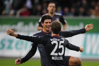 Thomas Mueller (Front) celebrates with Bayern Munich's striker Mario Gomez after scoring the first goal during the Bundesliga match VfL Wolfsburg vs Bayern Munich in Wolfsburg on January 15, 2011. AFP Thomas Mueller (Front) celebrates with Bayern Munich's striker Mario Gomez after scoring the first goal during the Bundesliga match VfL Wolfsburg vs Bayern Munich in Wolfsburg on January 15, 2011. AFP