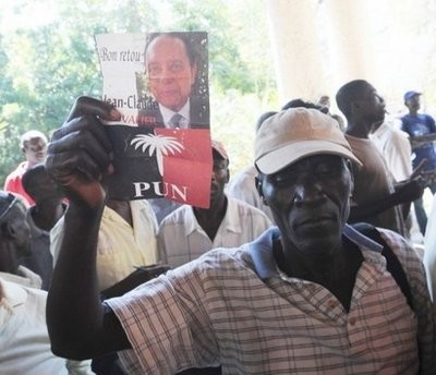AFP file - Supporters of ousted Haitian dictator Jean-Claude Duvalier demonstrate outside Hotel Karibe in Port-au-Prince. AFP file - Supporters of ousted Haitian dictator Jean-Claude Duvalier demonstrate outside Hotel Karibe in Port-au-Prince.