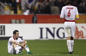 Iran's forwards Mohammad Reza Khalatbari (L) and Mohammad Reza Khalatbari (R) reacts after they were defeated by South Korea on January 22, 2011. South Korea won 1-0. AFP PHOTO Iran's forwards Mohammad Reza Khalatbari (L) and Mohammad Reza Khalatbari (R) reacts after they were defeated by South Korea on January 22, 2011. South Korea won 1-0. AFP PHOTO