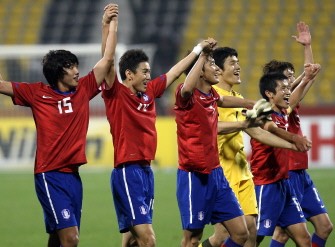 South Korean players celebrate after beating Iran on January 22, 2011. AFP South Korean players celebrate after beating Iran on January 22, 2011. AFP