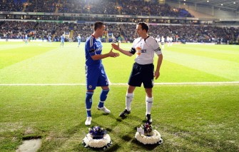 Chelsea captain John Terry (L) and Bolton Wanderers captain Kevin Davies place wreaths by the side of the pitch following the death of former Bolton and England footballer Nat Lofthouse who died recently, ahead of Bolton vs Chelsea match in Bolton on January 24, 2011. AFP Chelsea captain John Terry (L) and Bolton Wanderers captain Kevin Davies place wreaths by the side of the pitch following the death of former Bolton and England footballer Nat Lofthouse who died recently, ahead of Bolton vs Chelsea match in Bolton on January 24, 2011. AFP