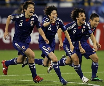 AFP - Japanese players celebrate after beating South Korea on penalties AFP - Japanese players celebrate after beating South Korea on penalties