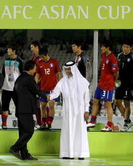 AFC president Mohammed bin Hammam (C) congratulates South Korea's coach Cho Kwang-Rae after his team beat Uzbekistan in their 2011 Asian Cup football match for third place at Al-Sadd Stadium in the Qatari capital Doha on January 28, 2011. AFP AFC president Mohammed bin Hammam (C) congratulates South Korea's coach Cho Kwang-Rae after his team beat Uzbekistan in their 2011 Asian Cup football match for third place at Al-Sadd Stadium in the Qatari capital Doha on January 28, 2011. AFP