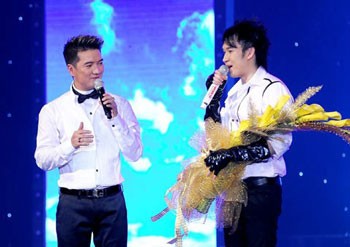 Singers Dam Vinh Hung (L) and Duong Trieu Vu Singers Dam Vinh Hung (L) and Duong Trieu Vu