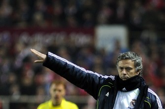 Real Madrid coach Jose Mourinho gestures during the Spanish King's Cup semifinal first leg Sevilla FC vs Real Madrid on January 26, 2011 at the Ramon Sanchez Pizjuan stadium in Sevilla. Real Madrid won 1-0. AFP Real Madrid coach Jose Mourinho gestures during the Spanish King's Cup semifinal first leg Sevilla FC vs Real Madrid on January 26, 2011 at the Ramon Sanchez Pizjuan stadium in Sevilla. Real Madrid won 1-0. AFP