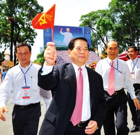 Chủ tịch nước Nguyễn Minh Triết tại lễ kỷ niệm 35 năm giải phóng miền Nam thống nhất đất nước. Ảnh: VIỆT DŨNG Chủ tịch nước Nguyễn Minh Triết tại lễ kỷ niệm 35 năm giải phóng miền Nam thống nhất đất nước. Ảnh: VIỆT DŨNG