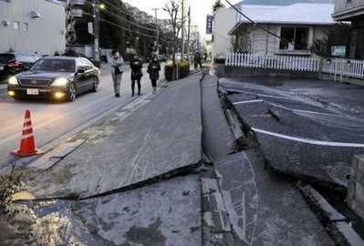 A pedestrian road has collapsed in the massive 8.9-magnitude earthquake in Urayasu city, Chiba prefecture. A pedestrian road has collapsed in the massive 8.9-magnitude earthquake in Urayasu city, Chiba prefecture.