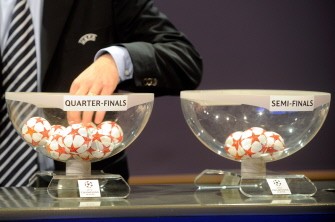 English football striker Gary Lineker draws on March 18, 2011 teams for the quarter-finals of the 2010-2011 Champions League at UEFA headquarters in Nyon. AFP English football striker Gary Lineker draws on March 18, 2011 teams for the quarter-finals of the 2010-2011 Champions League at UEFA headquarters in Nyon. AFP