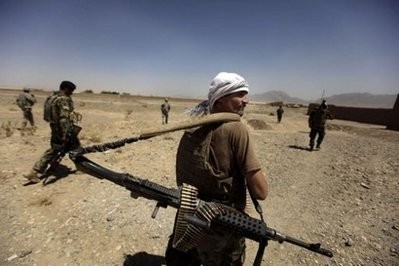 AFP file photo shows Afghan National Army (ANA) troops and US Army soldiers on patrol in the village of Jellawar in The Arghandab Valley. AFP file photo shows Afghan National Army (ANA) troops and US Army soldiers on patrol in the village of Jellawar in The Arghandab Valley.