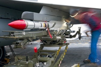 This handout picture released by ECPAD (The French Defence communication and audiovisual production agency) shows a mecanician mounting a Mica missile on a Rafale jet fighter, on March 23, 2011 in the mediterranean sea aboard the French aircraft carrier Charles de Gaulle during military operations in Libya. AFP HOTO / CYRIL DAVESNE / MARINE NATIONALE This handout picture released by ECPAD (The French Defence communication and audiovisual production agency) shows a mecanician mounting a Mica missile on a Rafale jet fighter, on March 23, 2011 in the mediterranean sea aboard the French aircraft carrier Charles de Gaulle during military operations in Libya. AFP HOTO / CYRIL DAVESNE / MARINE NATIONALE