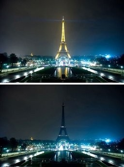 A combo shows the Eiffel tower submerging into darkness. A combo shows the Eiffel tower submerging into darkness.