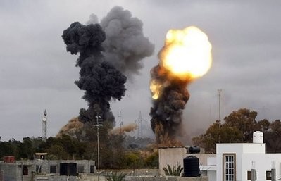 AFP - Smoke billows as explosions were reported in the tightly-guarded residence of leader Moamer Kadhafi and military targets in the suburb of Tajura AFP - Smoke billows as explosions were reported in the tightly-guarded residence of leader Moamer Kadhafi and military targets in the suburb of Tajura