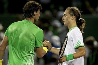 AFP - Nadal is congratulated by Alexandr Dolgopolov after their match AFP - Nadal is congratulated by Alexandr Dolgopolov after their match
