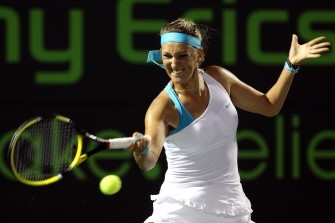 AFP - Azarenka hits a forehand return against Kim Clijsters on March 30, 2011 AFP - Azarenka hits a forehand return against Kim Clijsters on March 30, 2011