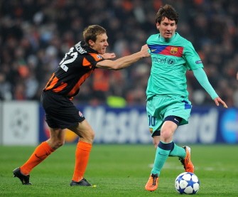 AFP - Messi (R) vies with Shakhtar Donetsk's defender Ishchenko Mykola (L) during the game AFP - Messi (R) vies with Shakhtar Donetsk's defender Ishchenko Mykola (L) during the game
