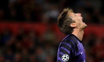 AFP - Manchester United's goalkeeper Edwin van der Sar reacts during the game AFP - Manchester United's goalkeeper Edwin van der Sar reacts during the game