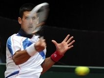AFP – Novak Djokovic of Serbia returns a ball against Spanish Guillermo Garcia-Lopez during their match AFP – Novak Djokovic of Serbia returns a ball against Spanish Guillermo Garcia-Lopez during their match
