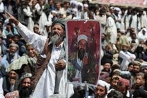 AFP - Pakistani Islamists chant anti-US slogans holding a picture of Osama bin Laden during a protest outskirt Quetta. AFP - Pakistani Islamists chant anti-US slogans holding a picture of Osama bin Laden during a protest outskirt Quetta.