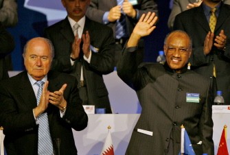 AFP file - Asian Football Confederation president Hammam (C) waves to the crowd as FIFA President Sepp Blatter (L) applauds after Hamman was re-elected unopposed for a second term as AFC president during the 22nd AFC Congress in Kuala Lumpur, on May 08, 2007. AFP file - Asian Football Confederation president Hammam (C) waves to the crowd as FIFA President Sepp Blatter (L) applauds after Hamman was re-elected unopposed for a second term as AFC president during the 22nd AFC Congress in Kuala Lumpur, on May 08, 2007.