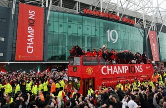 AFP - Manchester United supporters welcome a bus carrying the players and officials at Old Trafford in Manchester, north west England, on May 30 2011 as the team celebrate on the streets after winning the Premier league AFP - Manchester United supporters welcome a bus carrying the players and officials at Old Trafford in Manchester, north west England, on May 30 2011 as the team celebrate on the streets after winning the Premier league