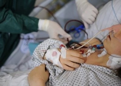 A nurse cares for a patient infected with the virulent E. coli bacteria undergoing dialysis treatment at a hospital in Hamburg on June 1 A nurse cares for a patient infected with the virulent E. coli bacteria undergoing dialysis treatment at a hospital in Hamburg on June 1
