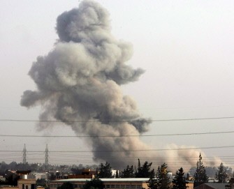AFP - Smoke billows from Tajura, a suburb of the Libyan capital Tripoli, on June 4, 2011 after NATO warplanes launched intensive air raids on Tripoli and its eastern suburbs. AFP - Smoke billows from Tajura, a suburb of the Libyan capital Tripoli, on June 4, 2011 after NATO warplanes launched intensive air raids on Tripoli and its eastern suburbs.
