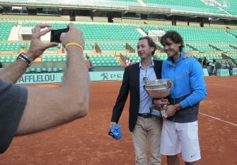 AFP - Rafael Nadal (L) poses with his agent Benito Perez Barbadillo after winning over Switzerland's Roger Federer in the men's final in the French Open tennis championship at the Roland Garros stadium, on June 5, 2011, in Paris. AFP - Rafael Nadal (L) poses with his agent Benito Perez Barbadillo after winning over Switzerland's Roger Federer in the men's final in the French Open tennis championship at the Roland Garros stadium, on June 5, 2011, in Paris.