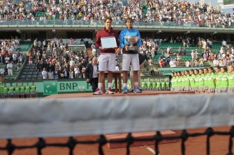 AFP - Rafael Nadal (R) and Roger Federer pose with their trophies after their men's final in the French Open tennis championship AFP - Rafael Nadal (R) and Roger Federer pose with their trophies after their men's final in the French Open tennis championship