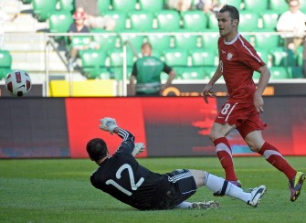 Pawel Brozek (R) from Poland scores a goal over Adrian Gabbarini of Argentina during their frindly match on June 5, 2011 in Warsaw. AFP Pawel Brozek (R) from Poland scores a goal over Adrian Gabbarini of Argentina during their frindly match on June 5, 2011 in Warsaw. AFP