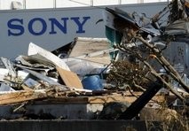 AFP/File – The logo of Japanese electronic giant Sony is seen amid piles of debris left by the March 11 tsunami AFP/File – The logo of Japanese electronic giant Sony is seen amid piles of debris left by the March 11 tsunami