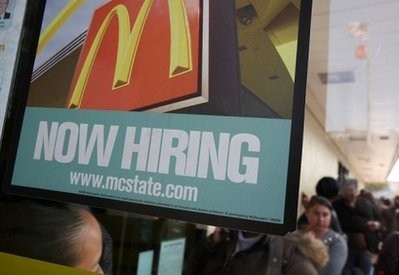 Job seekers wait in line to be interviewed during a one-day hiring event at a McDonald's restaurant in San Francisco, California. Job seekers wait in line to be interviewed during a one-day hiring event at a McDonald's restaurant in San Francisco, California.