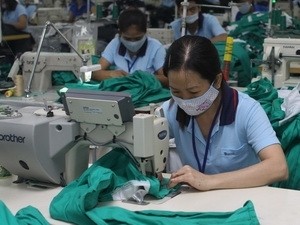 Vietnam News Agency file photo shows Vietnamese garment workers at a factory Vietnam News Agency file photo shows Vietnamese garment workers at a factory
