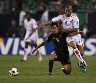 AFP - Israel Castro #8 of Mexico is pushed by Alvaro Saborio #9 of Costa Rica during the game AFP - Israel Castro #8 of Mexico is pushed by Alvaro Saborio #9 of Costa Rica during the game